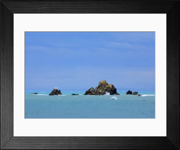 Framed Print : Sea Stacks jagged sea stacks amidst the South Pacific Ocean Kaikoura, Canterbury, North Island, New Zealand