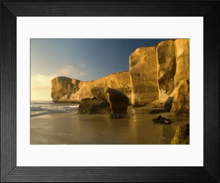 Framed Print : Tunnel Beach sculpted cliffs seen from Tunnel Beach right after sunrise Otago, South Island, New Zealand Framed Print : Tunnel Beach sculpted cliffs seen from Tunnel Beach right after sunrise Otago, South Island, New Zealand