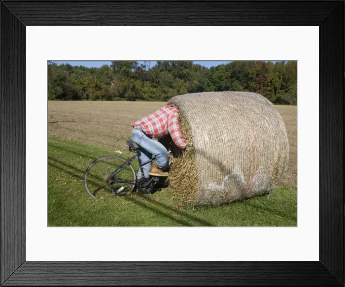 Framed Print : Bike Riding into hay bail Framed Print : Bike Riding into hay bail