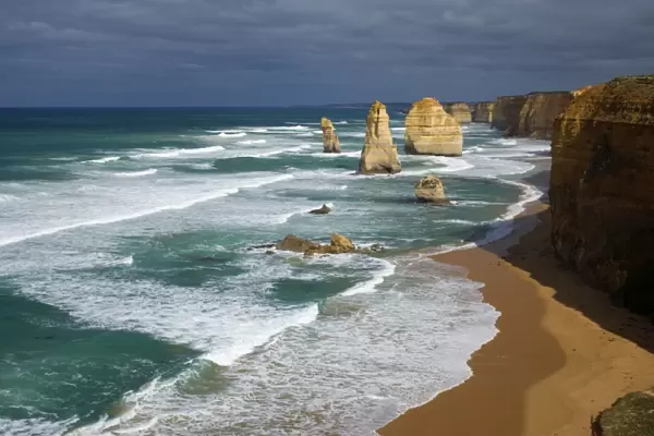 Twelve Apostles - a storm is brewing over the coastline and fragile sandstone stacks of the Twelve Apostles - Port Campbell National Park, Great Ocean Road, Victoria, Australia