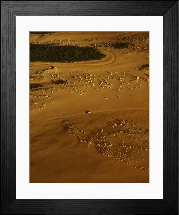 Framed Print : Aerial: ‘The Pinnacles limestone pillars formed underground by vertical seepage, and cemented by dissolved lime. Shifting sand dunes exposed pillars in the past 200 years, Nambung National Park, Western Australia JPF43772 Framed Print : Aerial: ‘The Pinnacles limestone pillars formed underground by vertical seepage, and cemented by dissolved lime. Shifting sand dunes exposed pillars in the past 200 years, Nambung National Park, Western Australia JPF43772