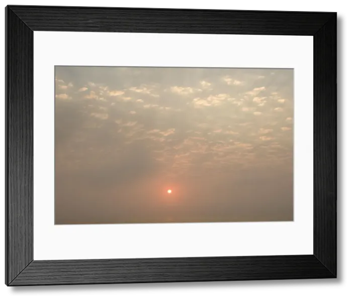 Framed Print : Sun setting over the Atlantic ocean - with dunes in the foreground - Dune Fields - Namib Desert - Namibia - Africa Framed Print : Sun setting over the Atlantic ocean - with dunes in the foreground - Dune Fields - Namib Desert - Namibia - Africa
