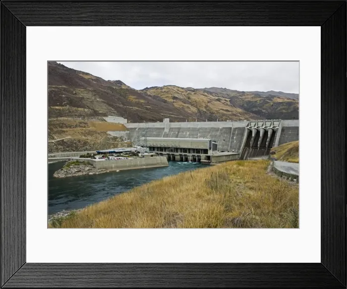 Framed Print : Dam - view of Clyde Dam and Lake Dunstan opened in 1994 New Zealand's third largest hydroelectric dam and the largest concrete gravity dam with a generation capacity of 400 MW providing 5% of the country's electricity Framed Print : Dam - view of Clyde Dam and Lake Dunstan opened in 1994 New Zealand's third largest hydroelectric dam and the largest concrete gravity dam with a generation capacity of 400 MW providing 5% of the country's electricity