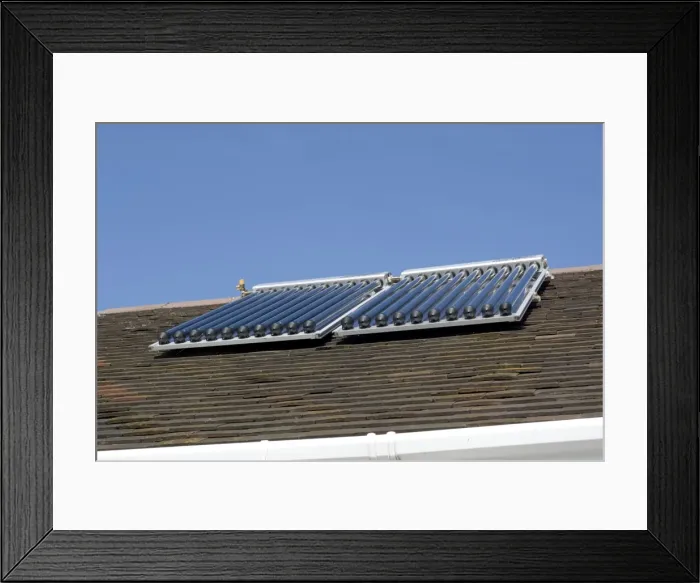 Framed Print : Solar thermal panels with evacuated tubes on roof of Worcestershire House provide domestic hot water UK Framed Print : Solar thermal panels with evacuated tubes on roof of Worcestershire House provide domestic hot water UK