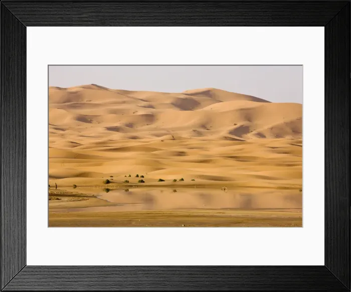 Framed Print : Temporary lake and dunes in the high Erg Chebbi sand dunes, Moroccan Sahara Desert, after very wet winter (spring 2009). Morocco Framed Print : Temporary lake and dunes in the high Erg Chebbi sand dunes, Moroccan Sahara Desert, after very wet winter (spring 2009). Morocco