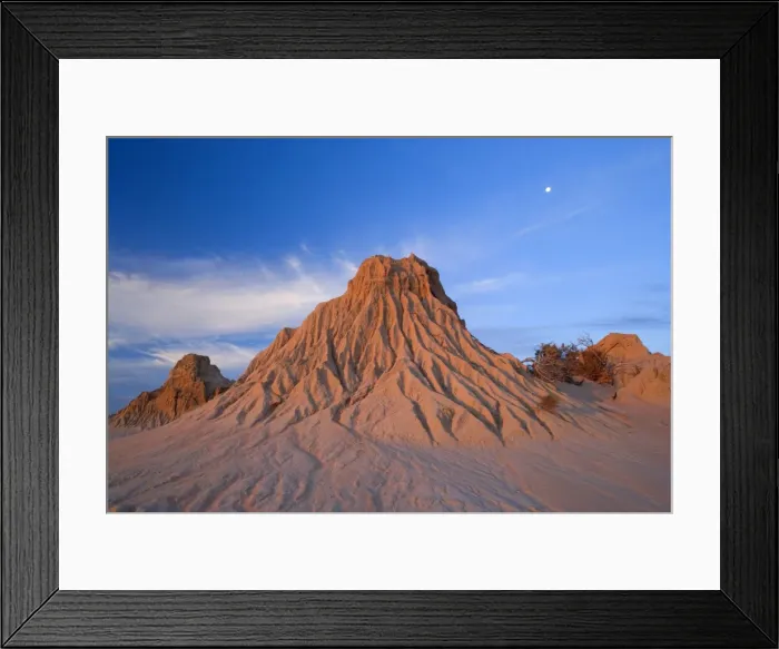 Framed Print : Eroded pinnacles - last evening sunrays on amazingly shaped, eroded pinnacles of the lunette Walls of China, located within the since 18000 years dried-up lakebed of Lake Mungo Framed Print : Eroded pinnacles - last evening sunrays on amazingly shaped, eroded pinnacles of the lunette Walls of China, located within the since 18000 years dried-up lakebed of Lake Mungo