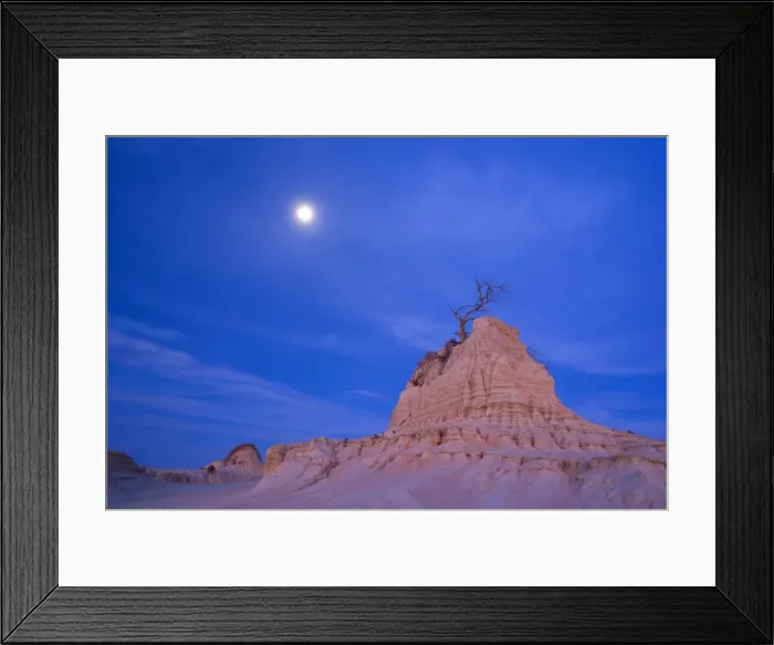Framed Print : Eroded pinnacle - amazingly shaped, eroded pinnacle of the lunette Walls of China, located within the since 18000 years dried-up lakebed of Lake Mungo, at near dark Framed Print : Eroded pinnacle - amazingly shaped, eroded pinnacle of the lunette Walls of China, located within the since 18000 years dried-up lakebed of Lake Mungo, at near dark