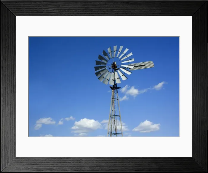 Framed Print : Wind wheel - typical wind wheel used in Australia's outback to pump water, and fluffy clouds - Outback Queensland, Australia Framed Print : Wind wheel - typical wind wheel used in Australia's outback to pump water, and fluffy clouds - Outback Queensland, Australia