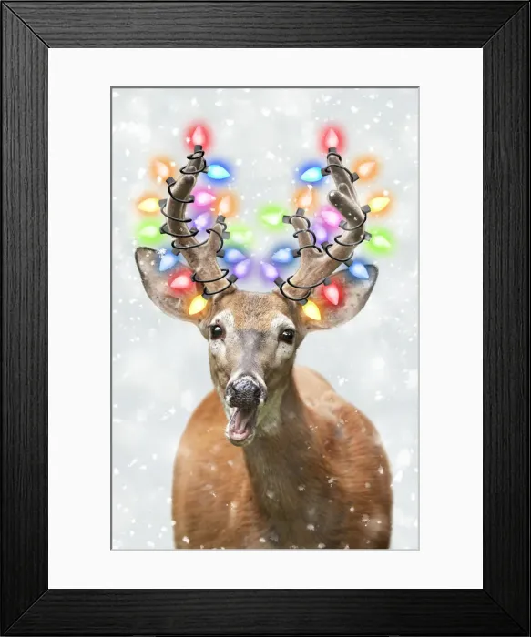 Framed Print : 13131044. White-tailed Deer with Christmas lights in winter snow Date Framed Print : 13131044. White-tailed Deer with Christmas lights in winter snow Date