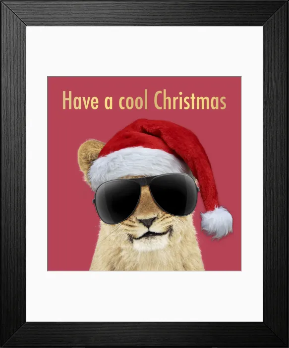 Framed Print : 13131727. Lion cubs (approx 16 weeks old) wearing Christmas hat and sunglasses Date Framed Print : 13131727. Lion cubs (approx 16 weeks old) wearing Christmas hat and sunglasses Date