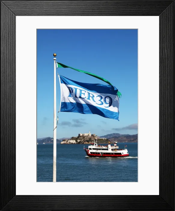Framed Print : 13132533. Pier 39 flag, sightseeing boat and Alcatraz prison island in San Franciso Framed Print : 13132533. Pier 39 flag, sightseeing boat and Alcatraz prison island in San Franciso