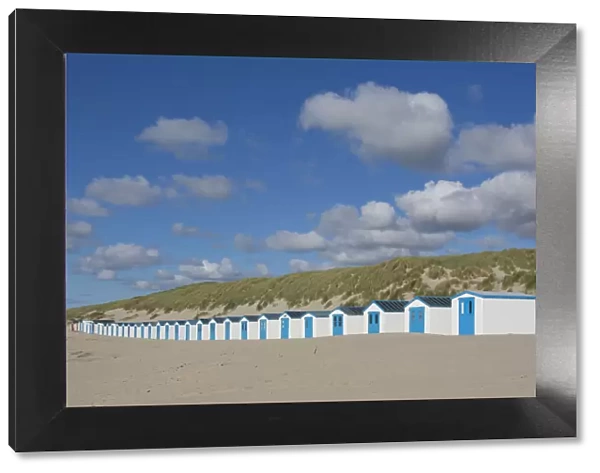 13132643. Colourful huts at the beach - island of Texel - Netherlands Date