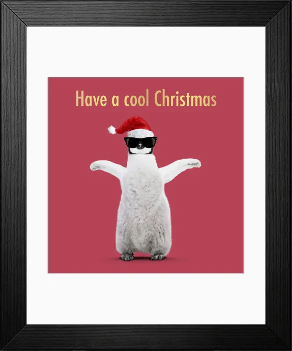 Framed Print : 13132699. Emperor Penguin, young arms raised with Christmas hat and sunglasses Date Framed Print : 13132699. Emperor Penguin, young arms raised with Christmas hat and sunglasses Date