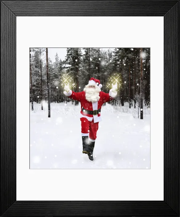 Framed Print : Father Christmas / Santa Claus waking through snow landscape with trees Framed Print : Father Christmas / Santa Claus waking through snow landscape with trees