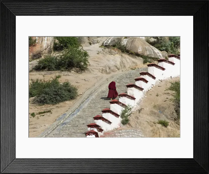 Framed Print : Monk walking the stairs in Drepung Monastery, one of the great three Gelug university monasteries of Tibet, Lhasa, Tibet, China Date: 06-09-2018 Framed Print : Monk walking the stairs in Drepung Monastery, one of the great three Gelug university monasteries of Tibet, Lhasa, Tibet, China Date: 06-09-2018