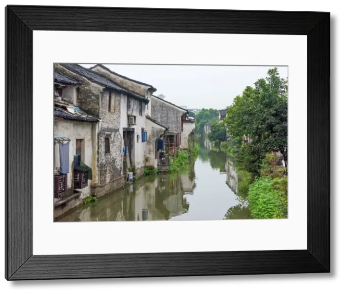 Framed Print : Traditional houses along the Grand Canal, Shaoxing, Zhejiang Province, China Date: 22-09-2018 Framed Print : Traditional houses along the Grand Canal, Shaoxing, Zhejiang Province, China Date: 22-09-2018