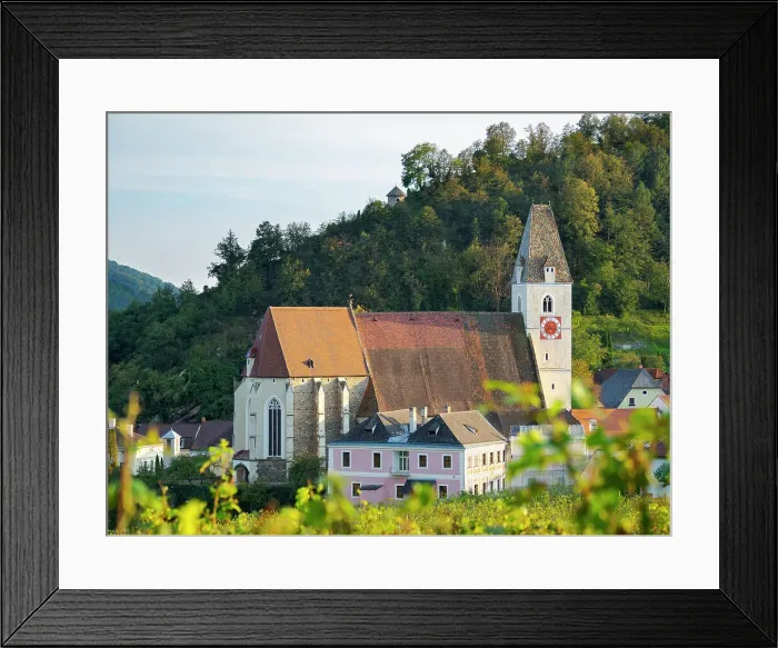 Framed Print : Church Heiliger Mauritius (Saint Maurice). Historic village Spitz located in wine-growing area, UNESCO World Heritage Site. Lower Austria Date: 10-09-2020