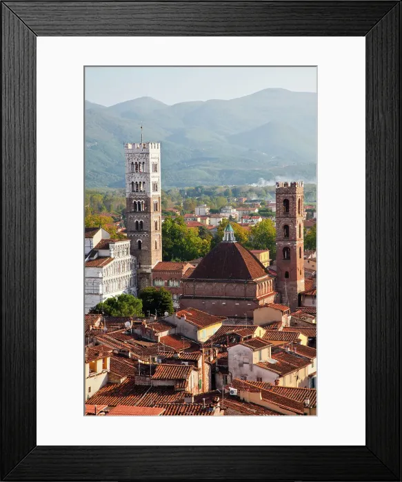 Framed Print : Italy, Tuscany, Lucca. The rooftops of the historic center of Lucca and the medieval bell tower of St. Martin Cathedral. Date: 09-10-2010 Framed Print : Italy, Tuscany, Lucca. The rooftops of the historic center of Lucca and the medieval bell tower of St. Martin Cathedral. Date: 09-10-2010
