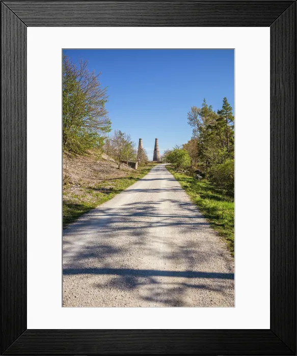 Framed Print : Sweden, Gotland Island, Bungenas, former chalk mine and military base, now an exclusive vacation development and nature preserve, smokestacks of former lime factory Date: 15-05-2019 Framed Print : Sweden, Gotland Island, Bungenas, former chalk mine and military base, now an exclusive vacation development and nature preserve, smokestacks of former lime factory Date: 15-05-2019