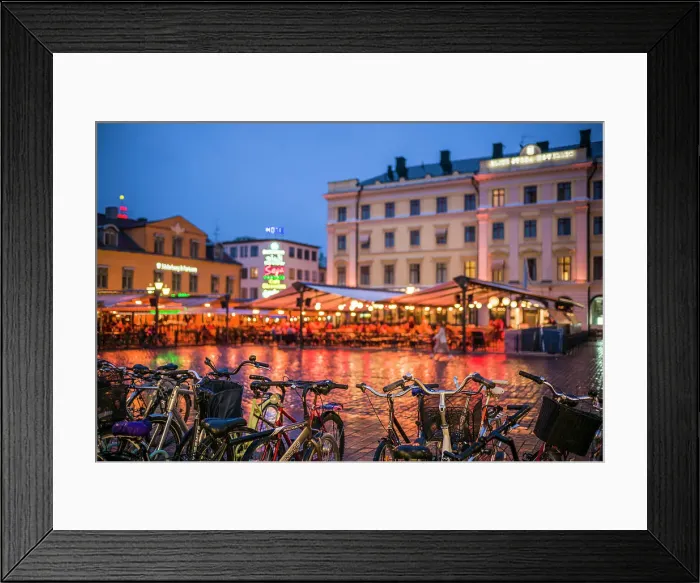 Framed Print : Sweden, Linkoping, cafes and bars on Stora target square, dusk Date: 18-05-2019 Framed Print : Sweden, Linkoping, cafes and bars on Stora target square, dusk Date: 18-05-2019
