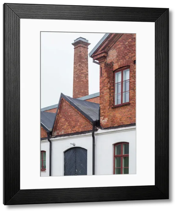 Framed Print : Sweden, Glasriket, Kingdom of Glass historical glass making region, Nybro, Pukeberg Glasbruk, Swedish School of Glass, exterior Date: 19-05-2019 Framed Print : Sweden, Glasriket, Kingdom of Glass historical glass making region, Nybro, Pukeberg Glasbruk, Swedish School of Glass, exterior Date: 19-05-2019