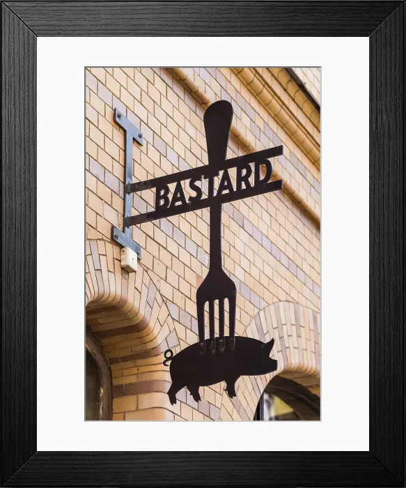 Framed Print : Sweden, Scania, Malmo, Lilla Torg square area, sign for the Bastard Restaurant Date: 24-05-2019