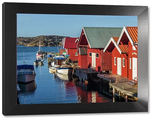 Sweden, Bohuslan, Kungshamn, red fishing shacks in the Fisketangen, old fisherman's neighborhood Date: 02-06-2019