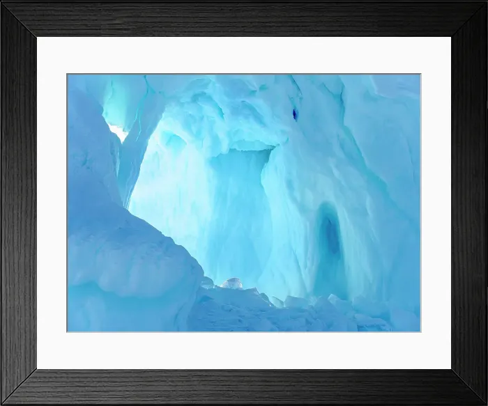 Framed Print : Iceberg frozen into the sea ice of the Uummannaq fjord system during winter. Greenland, Danish Territory Date: 06-03-2020