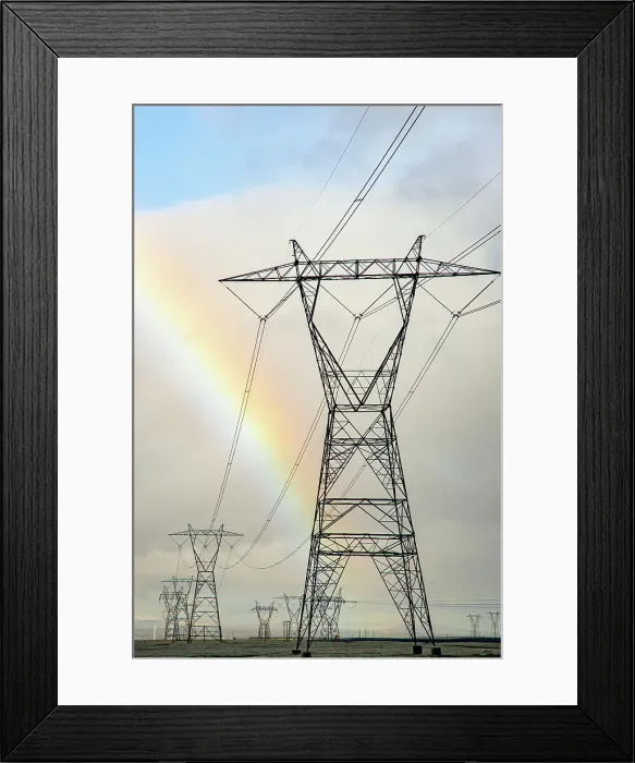 Framed Print : USA, California. Mojave Desert, Antelope Valley, Lancaster, 110 Street, rainbow and Transmission Line from solar panel farm Date: 04-02-2019