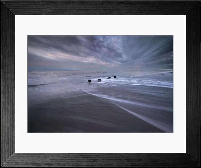 Framed Print : USA, New Jersey, Cape May National Seashore. Pier stumps on shore at sunrise. Date: 06-11-2021 Framed Print : USA, New Jersey, Cape May National Seashore. Pier stumps on shore at sunrise. Date: 06-11-2021