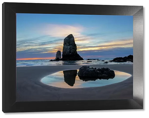 Haystack Rock Pinnacles at low tide in Cannon Beach, Oregon, USA Date: 07-10-2021