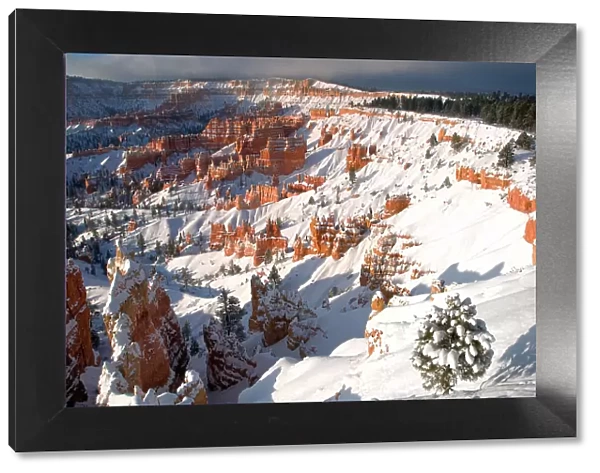 USA, Utah, Bryce Canyon National Park. Winter sunrise on snow-covered landscape. Date: 17-03-2008