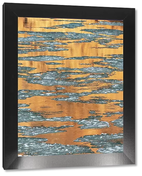 USA, Utah. Abstract design, reflections of canyon walls on the icy Colorado River, Colorado River Recreation Area, near Moab. Date: 12-01-2021