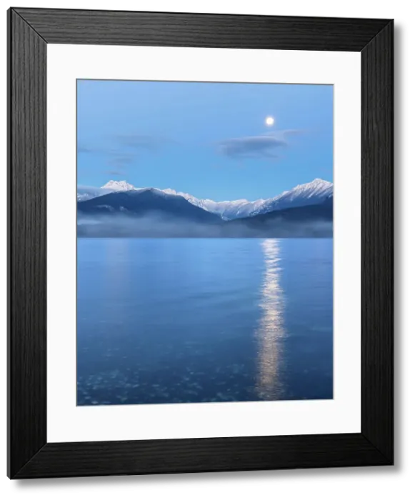 Framed Print : USA, Washington State, Seabeck. Moon setting over the Olympic Mountains and Hood Canal. Date: 29-01-2021 Framed Print : USA, Washington State, Seabeck. Moon setting over the Olympic Mountains and Hood Canal. Date: 29-01-2021