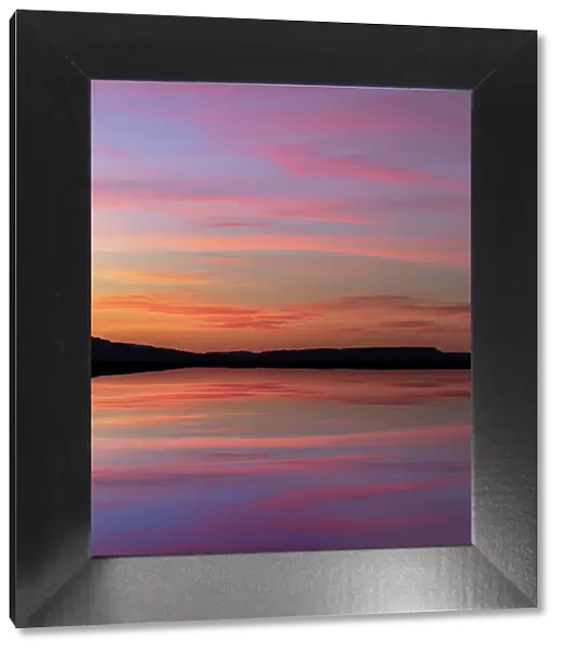 USA, Washington State, Seabeck. Composite sunset over Hood Canal. Date: 10-08-2021