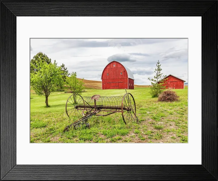 Framed Print : Albion, Washington State, USA. Red barns and antique farm equipment in the Palouse hills. (Editorial Use Only) Date: 23-05-2021 Framed Print : Albion, Washington State, USA. Red barns and antique farm equipment in the Palouse hills. (Editorial Use Only) Date: 23-05-2021