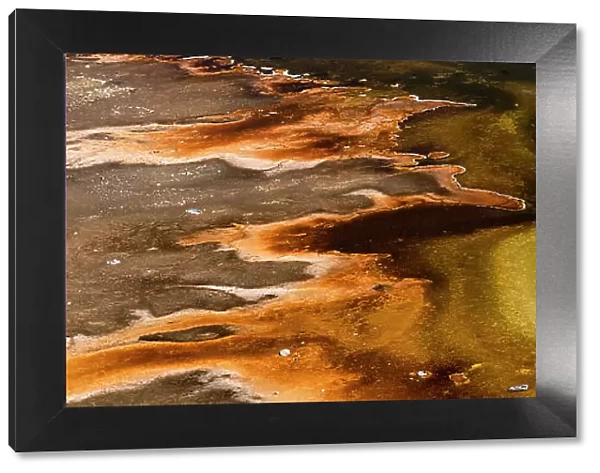 USA, Wyoming. Colorful abstract designs of hydrothermal pools near Great Fountain Geyser, Yellowstone National Park. Date: 29-09-2020