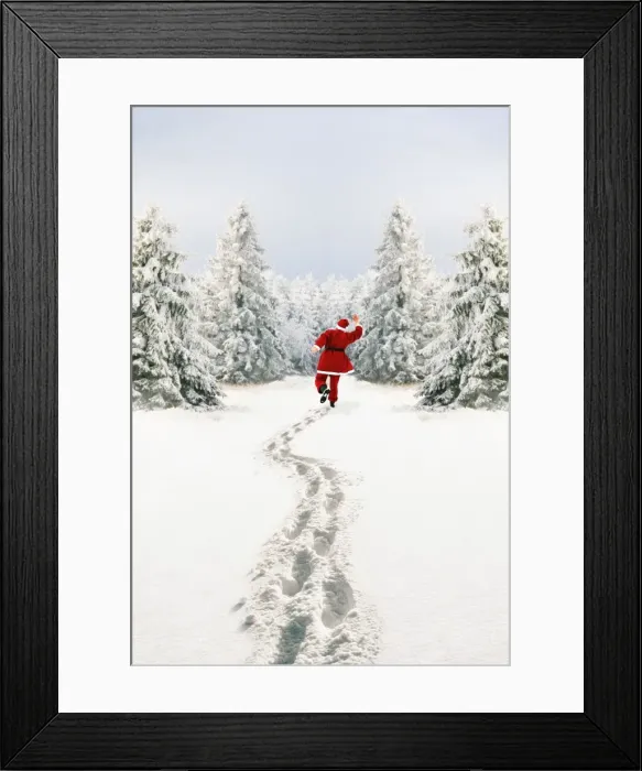 Framed Print : Snow - Father Christmas making footprints in winter landscape with conifers Framed Print : Snow - Father Christmas making footprints in winter landscape with conifers