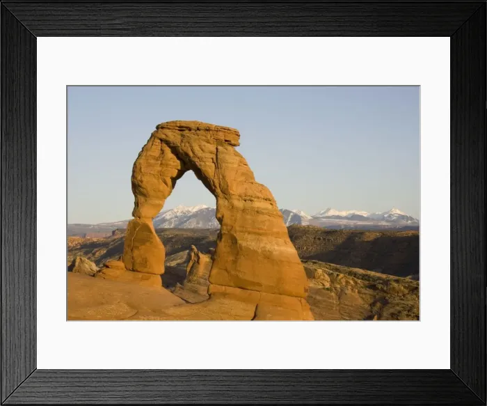Framed Print : USA - Delicate Arch probably is the most famous sandstone rock sculpture in the Arches National Park. In the background the snow-capped La Sal Mountains. Photographed in spring (April). Arches National Park, Utah, USA Framed Print : USA - Delicate Arch probably is the most famous sandstone rock sculpture in the Arches National Park. In the background the snow-capped La Sal Mountains. Photographed in spring (April). Arches National Park, Utah, USA