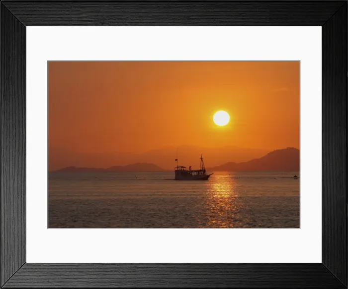 Framed Print : Flores Island - showing boat transport to island at sunset. Indonesia Framed Print : Flores Island - showing boat transport to island at sunset. Indonesia