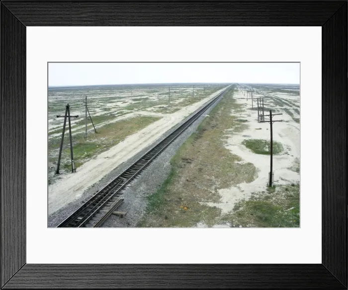Framed Print : Railway Ashgabad - Krasnovodsk - in desert landscape along the Kopet-Dag mountains - a major transport artery in Turkmenistan - former CIS - Spring - April Tm31. 0350 Framed Print : Railway Ashgabad - Krasnovodsk - in desert landscape along the Kopet-Dag mountains - a major transport artery in Turkmenistan - former CIS - Spring - April Tm31. 0350