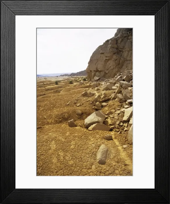 Framed Print : Arabian Desert - rocks and sand, appr. 50 km from Hurghada town (Red sea shore); animal path along the rock (some human footprints as well). January Eg39. 0009 Framed Print : Arabian Desert - rocks and sand, appr. 50 km from Hurghada town (Red sea shore); animal path along the rock (some human footprints as well). January Eg39. 0009