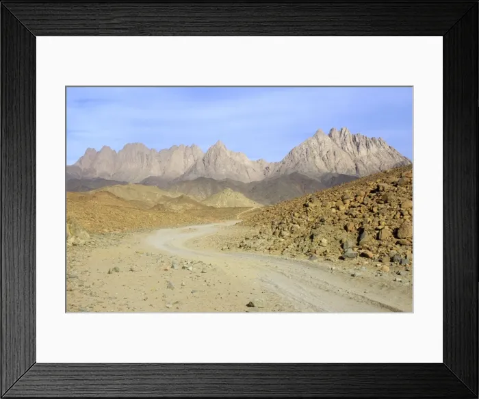 Framed Print : Egypt - road winds in rocks in Arabian desert approx. 50 km from Hurghada town (Red Sea shore), evening; January Eg39. 0225 Framed Print : Egypt - road winds in rocks in Arabian desert approx. 50 km from Hurghada town (Red Sea shore), evening; January Eg39. 0225