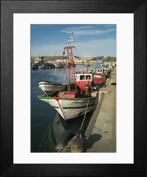 Framed Print : Charming fishing port at Nazare, Portugal. Sardine fishing being the principle activity. November Framed Print : Charming fishing port at Nazare, Portugal. Sardine fishing being the principle activity. November