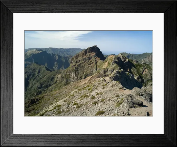 Framed Print : The Summit - Pico do Arieiro. At a height of 1818 m. this is the third highest peak in Madeiro. The predominant colours of purple, burnt orange and chocolate brown are a reminder of the Island's volcanic origins. February Framed Print : The Summit - Pico do Arieiro. At a height of 1818 m. this is the third highest peak in Madeiro. The predominant colours of purple, burnt orange and chocolate brown are a reminder of the Island's volcanic origins. February