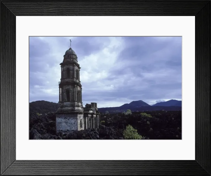 Framed Print : Paricutin volcano, Mexico - State of Michoacan Paricutin volcano is the cone visible in the distance. The lava flows buried the village, only the church tower and part of the facade were left standing Framed Print : Paricutin volcano, Mexico - State of Michoacan Paricutin volcano is the cone visible in the distance. The lava flows buried the village, only the church tower and part of the facade were left standing