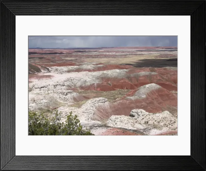 Framed Print : View over Painted Desert, the white layers are sandstone, the reds are either iron stained siltstone or rocks stained by iron oxide. Arizona, USA Framed Print : View over Painted Desert, the white layers are sandstone, the reds are either iron stained siltstone or rocks stained by iron oxide. Arizona, USA