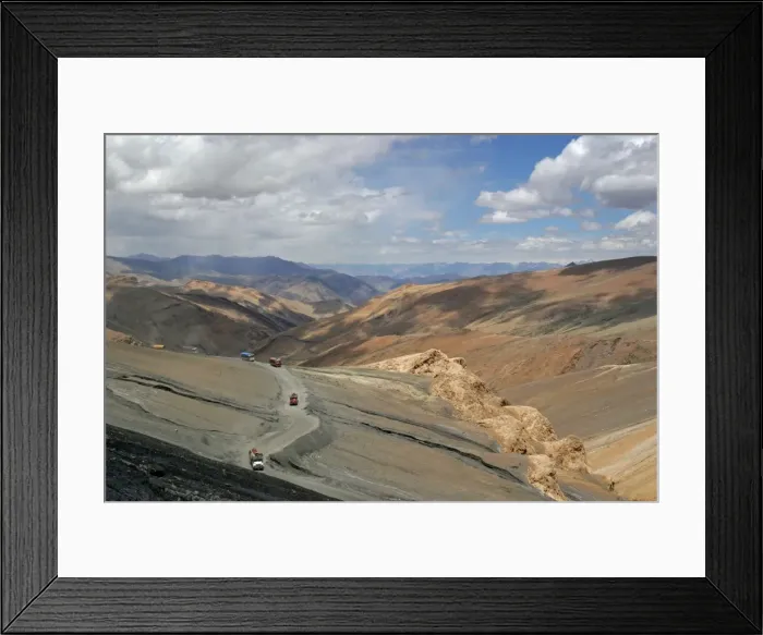 Framed Print : Trucks descending from Taglang La (5359m pass on Manali Leh road). Ladakh India North side Framed Print : Trucks descending from Taglang La (5359m pass on Manali Leh road). Ladakh India North side