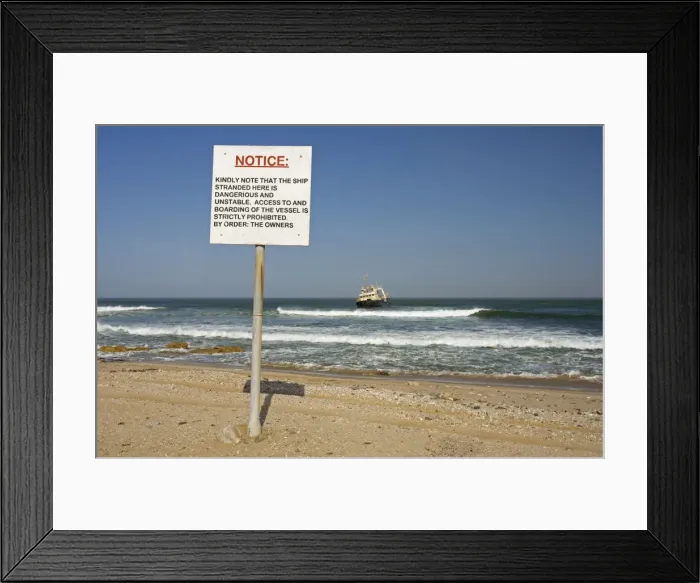 Framed Print : The Kolmanskop Stranded On rocky reef near Swakopmund, warning notice Namibia, Africa
