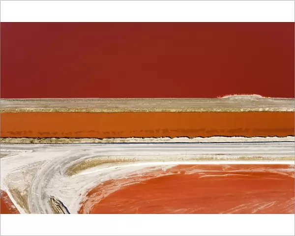 Evaporation ponds for the commercial extraction of sea salt - showing the bright resulting colours - Near Swakopmund - Namib Desert - Atlantic Coast - Namibia - Africa